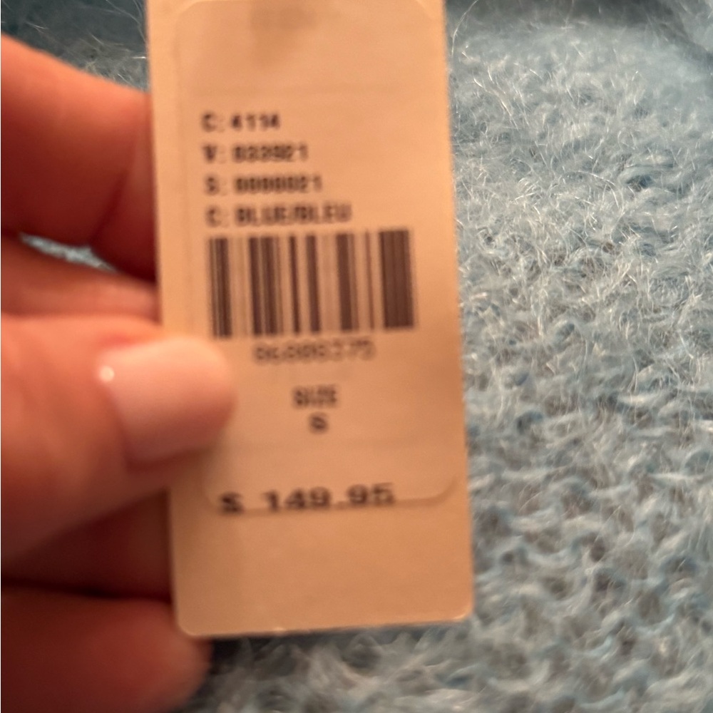 Anthropologie Light Tiffany Blue Fuzzy Knit Cardigan
Smoke and pet free home